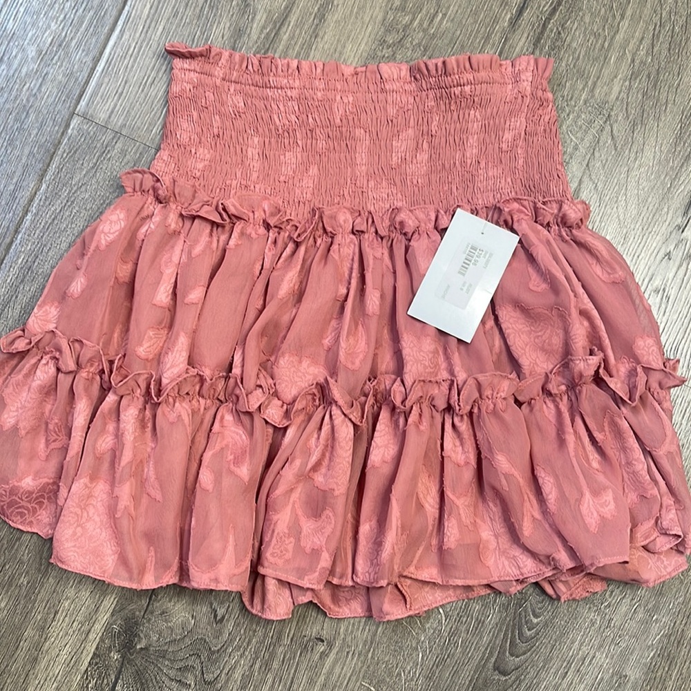 Dusty Rose Pink lined mini skirt with floral detail in fabric. Size small.